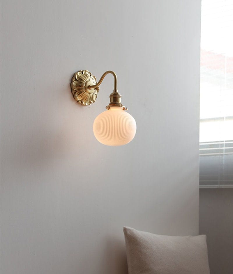 Vintage Ribbed Globe White Ceramic Wall Light with Carved Flower Fixture in Modern Living Room