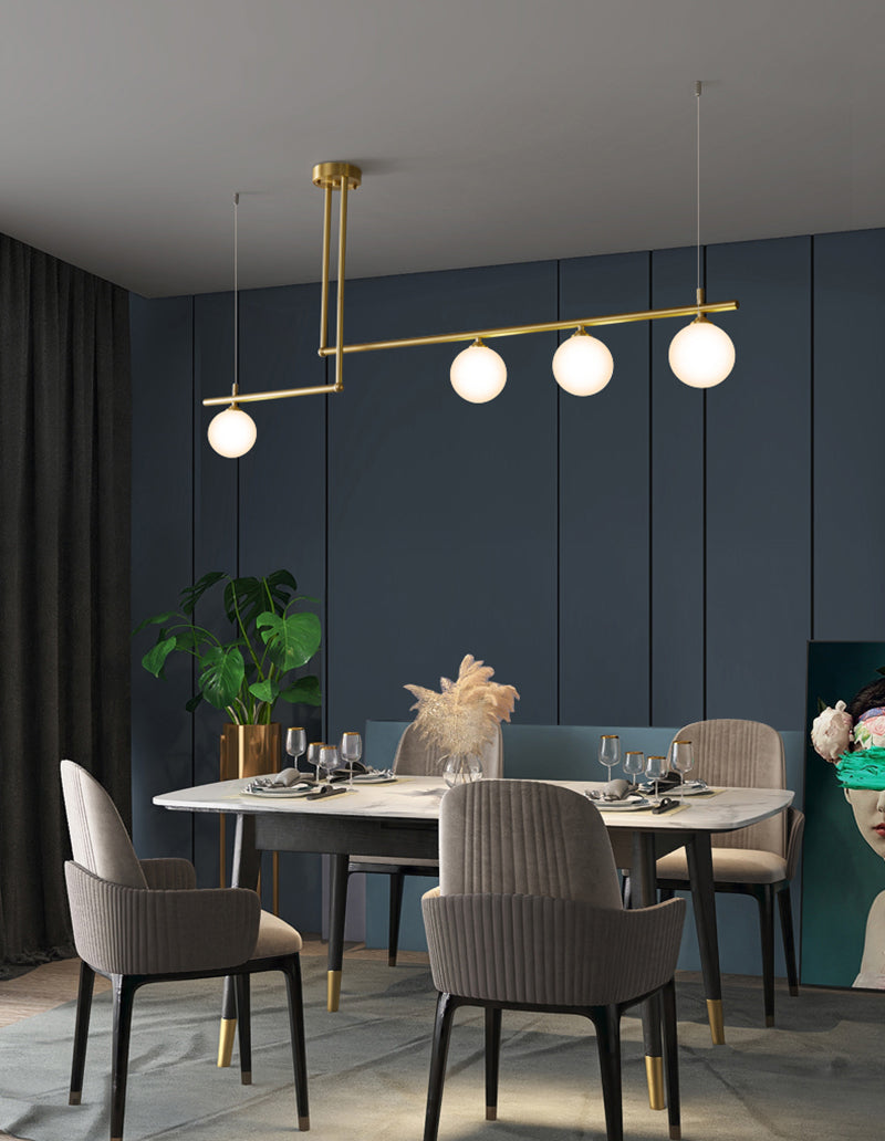 Chandelier_with_LED_Globes_and_Brushed_Brass_Lamp_Holder_in_Mid-Century_Modern_Style_in_Mid-Century_Living_Room