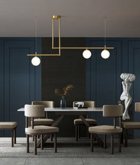 Chandelier with LED Globes and Brushed Brass Lamp Holder in Mid-Century Modern Style_in Modern Dining Room