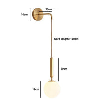 Dangling Milky Glass Globe LED Wall Light with Brushed Brass Lamp Fixture in Mid-Century Modern Style