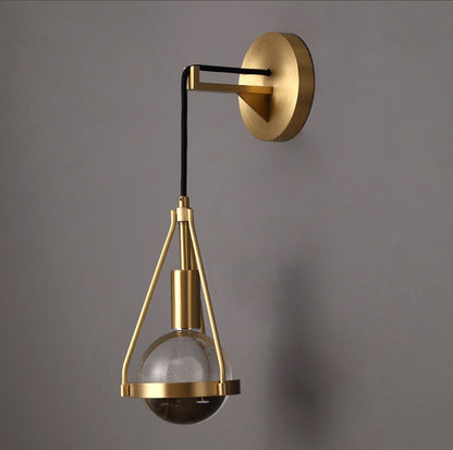 Modern &amp; Contemporary Raindrop Golden Wall Light Close up - unlit