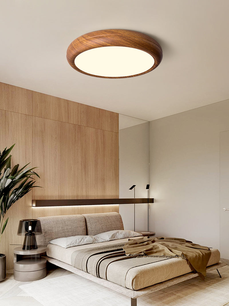 Round Curvy Wooden LED Flush Mount Ceiling Light in Scandinavian Style in Cozy Bedroom