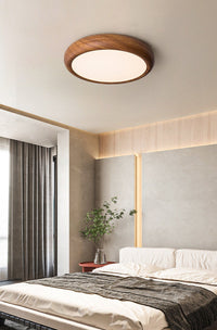 Round Curvy Wooden LED Flush Mount Ceiling Light in Scandinavian Style in Cozy Scandinavian Bedroom