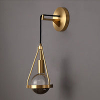 Shiny LED Glass Raindrop Wall Light with Brushed Brass Frame in Modern & Contemporary Style Close up - unlit