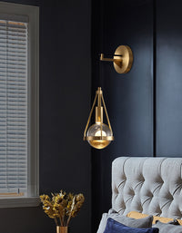 Shiny LED Glass Raindrop Wall Light with Brushed Brass Frame in Modern & Contemporary Style in Contemporary Living Space
