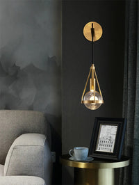 Shiny LED Glass Raindrop Wall Light with Brushed Brass Frame in Modern & Contemporary Style in Modern Living Space