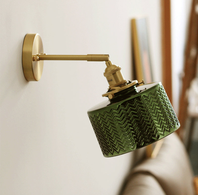 Shiny_Green_Glass_Cylinder_LED_Wall_Light_in_Art_Deco_Style_in_Cozy_Space